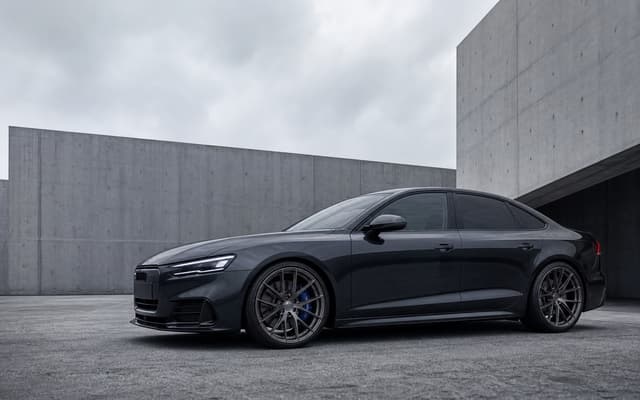 Conceptual dark performance sedan fitted with bronze forged wheels